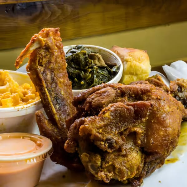 Crispy fried turkey, mac and cheese, collard greens, and a roll from The Turkey Grill.