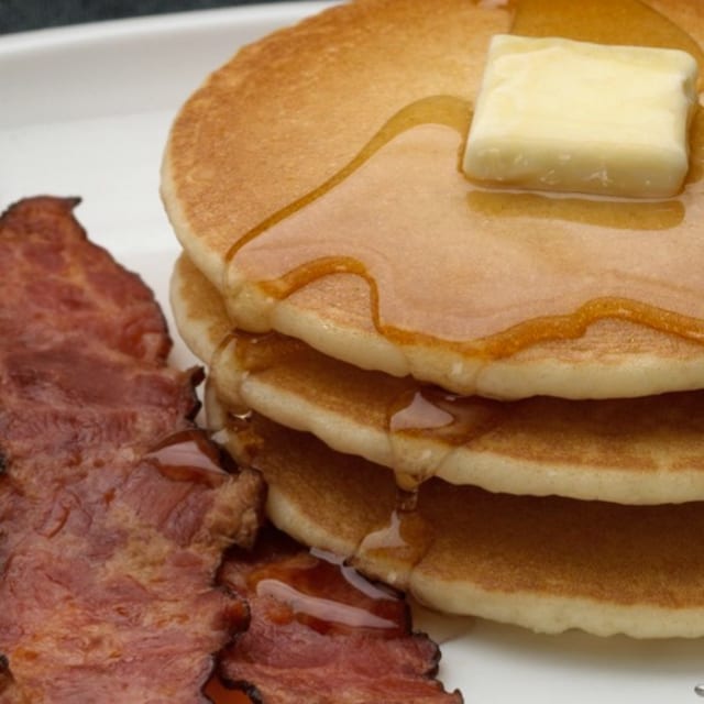 Pancakes & 2 Strips Of Turkey Bacon.